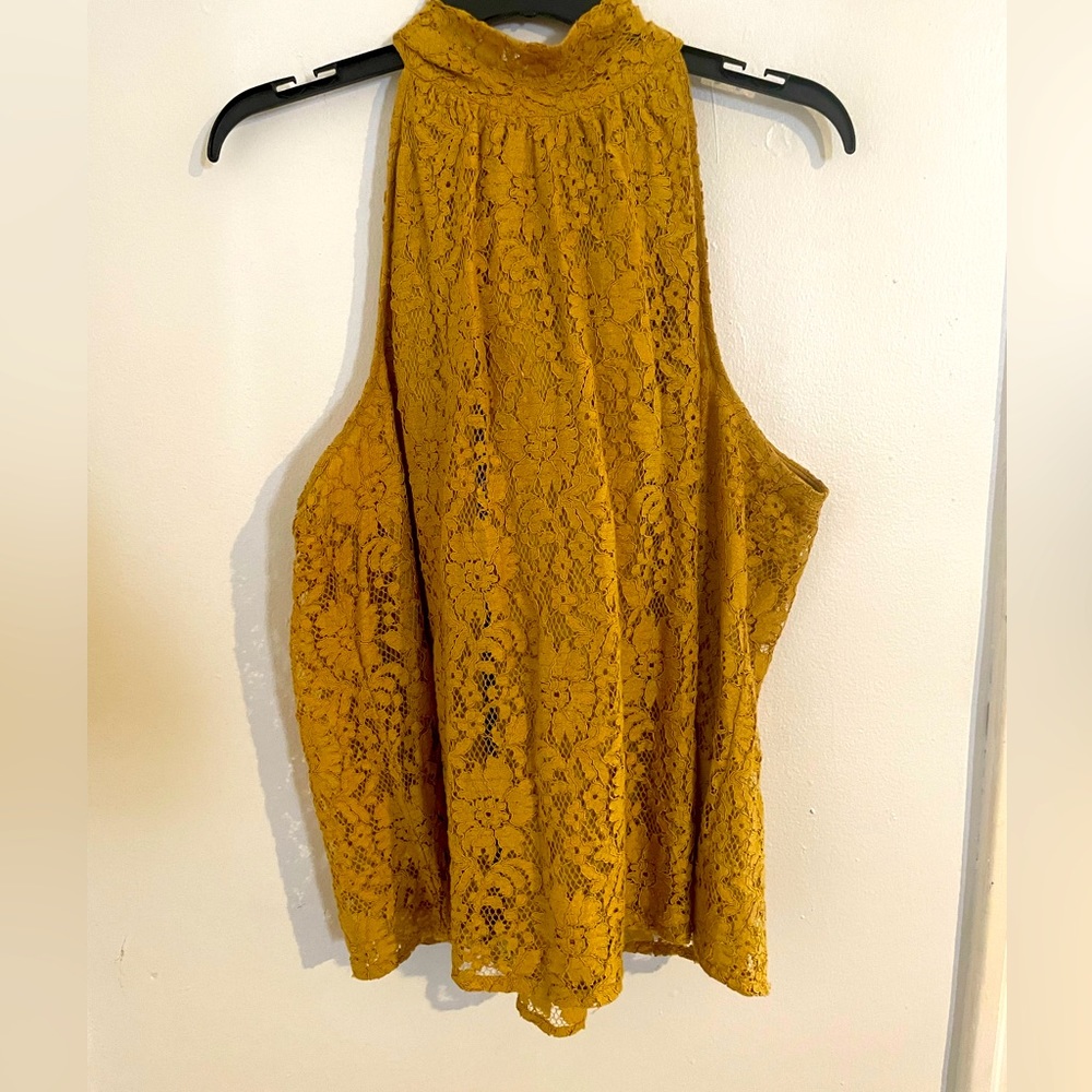 Lace, mustard~colored, halter~style top with a strategic, hand tie bow! Worn 1x.